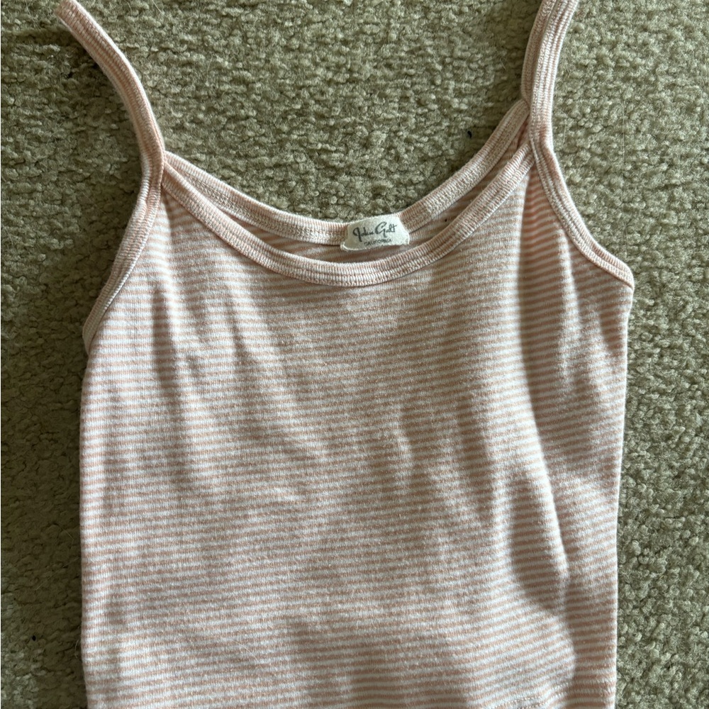 Light pink striped brandy melville tank. Never worn, one size.